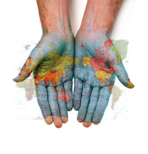 world map on hands