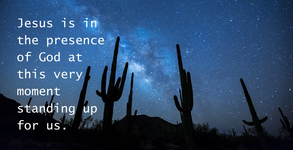Quote about Jesus' presence overlaid on desert sky.