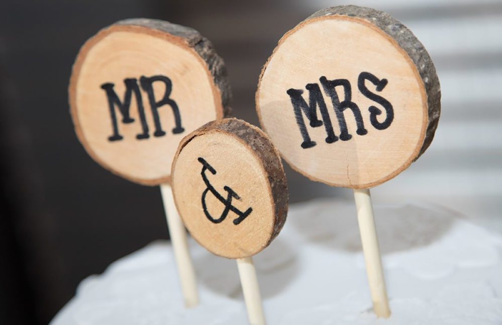 Mister and Misses wooden cake toppers for wedding.